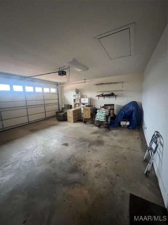 garage featuring a garage door opener