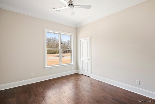 empty room with crown molding, dark hardwood / wood-style floors, and ceiling fan