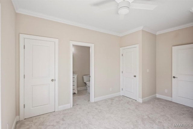 unfurnished bedroom with light carpet, crown molding, ceiling fan, and ensuite bathroom