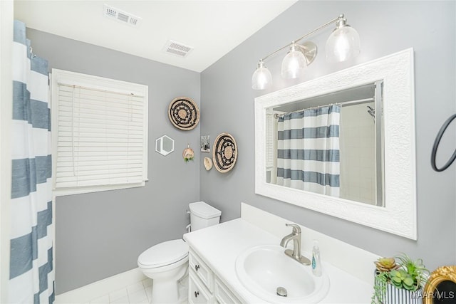 bathroom featuring a shower with curtain, vanity, tile patterned flooring, and toilet