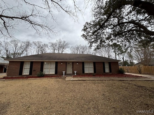 single story home with a front yard