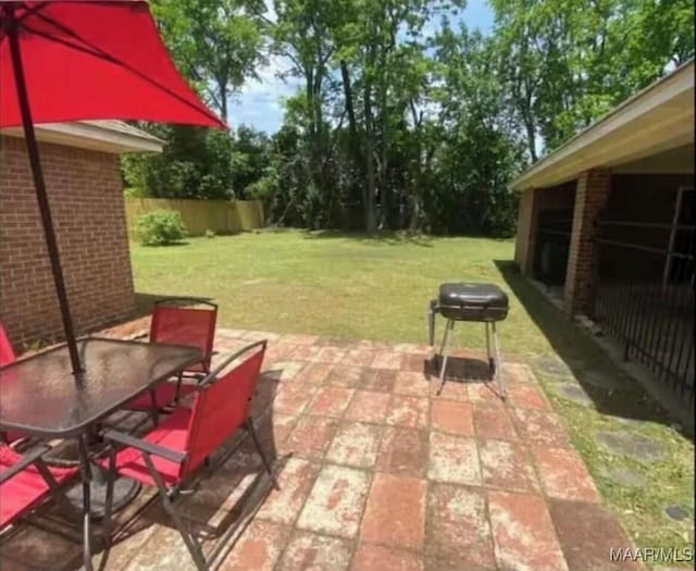 view of patio / terrace with fence