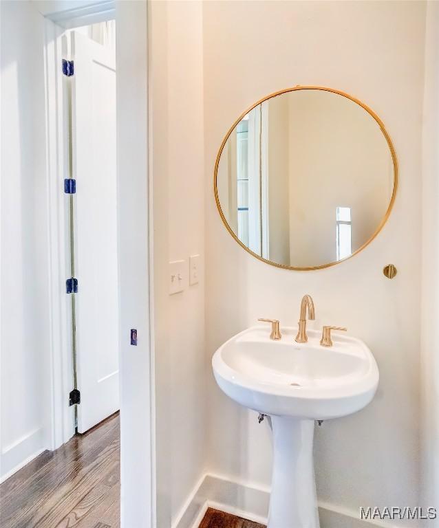 bathroom featuring wood finished floors