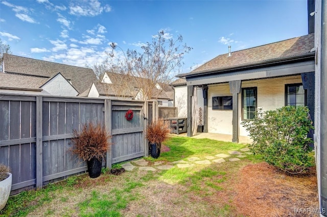 view of yard featuring fence