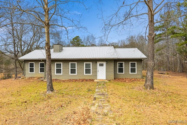 ranch-style house with a front lawn