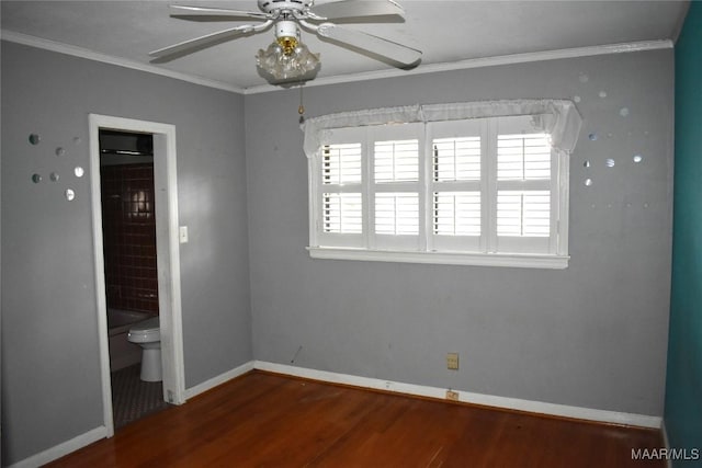 unfurnished bedroom with hardwood / wood-style flooring and ornamental molding