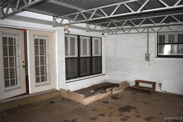 doorway to property featuring a patio area