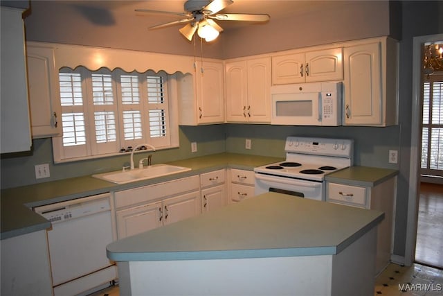 kitchen with ceiling fan, sink, white cabinets, and white appliances