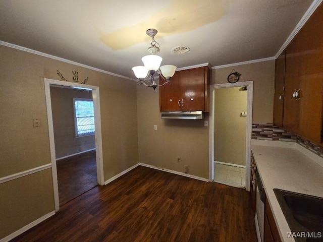 interior space with crown molding, sink, a chandelier, and dark wood-type flooring