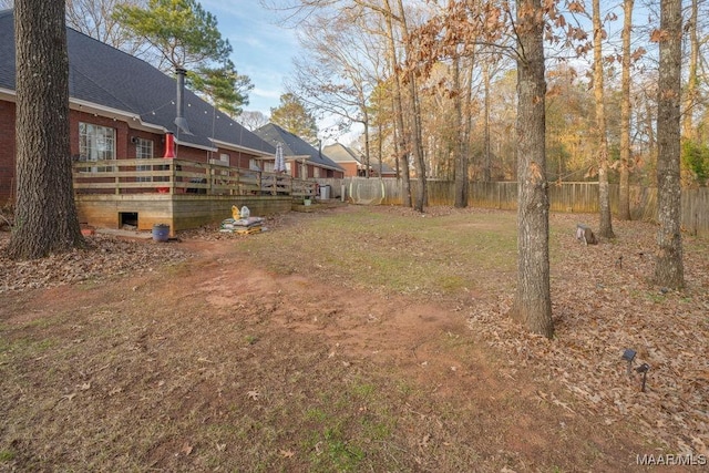 view of yard with a deck