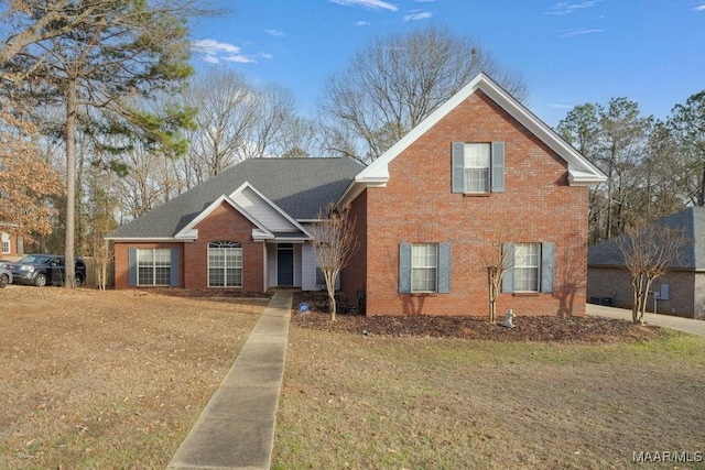 view of front of property with a front lawn