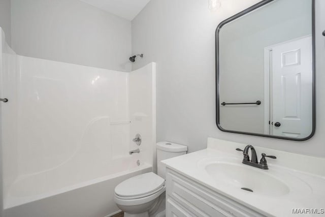 full bathroom featuring shower / tub combination, vanity, and toilet