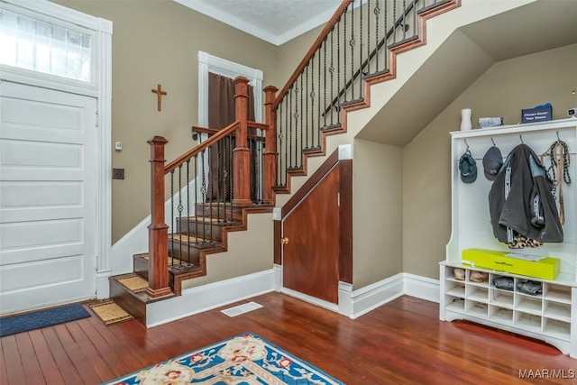 entryway with wood-type flooring