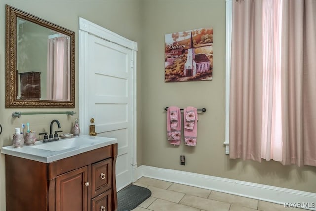 bathroom featuring tile patterned floors and vanity