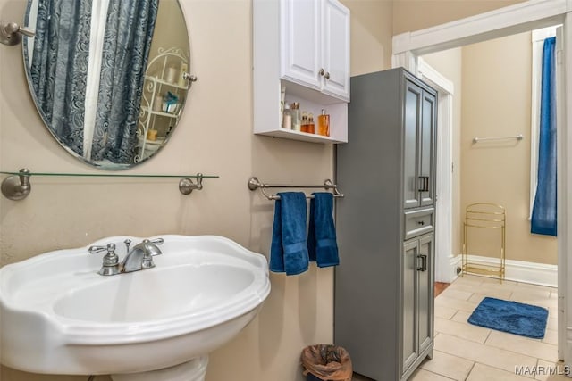 bathroom with sink and tile patterned floors