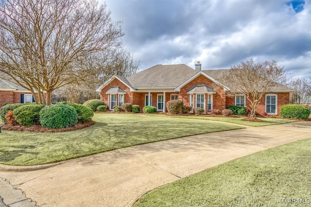 ranch-style house with a front yard