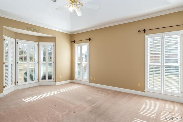 unfurnished room with crown molding, ceiling fan, and light carpet