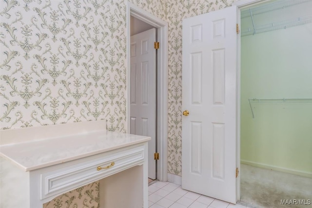 bathroom with tile patterned flooring