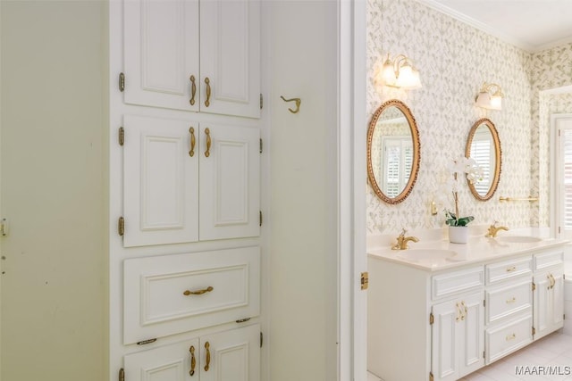 bathroom featuring vanity and ornamental molding