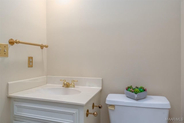 bathroom with toilet and sink