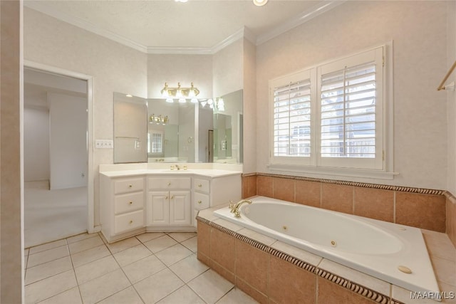 bathroom with a relaxing tiled tub, vanity, crown molding, and tile patterned flooring