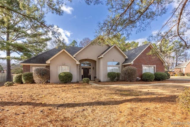 ranch-style home with a garage