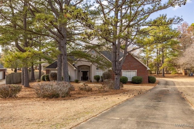 ranch-style house featuring a garage