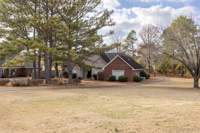 view of front facade with a front lawn