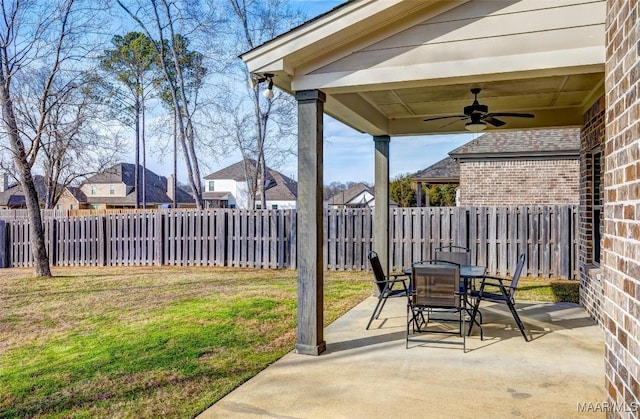 view of patio with ceiling fan