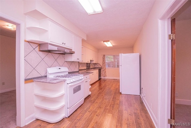 kitchen featuring sink, light hardwood / wood-style flooring, white appliances, decorative backsplash, and white cabinets