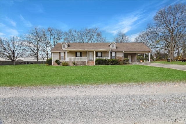 single story home with a porch, a carport, and a front yard