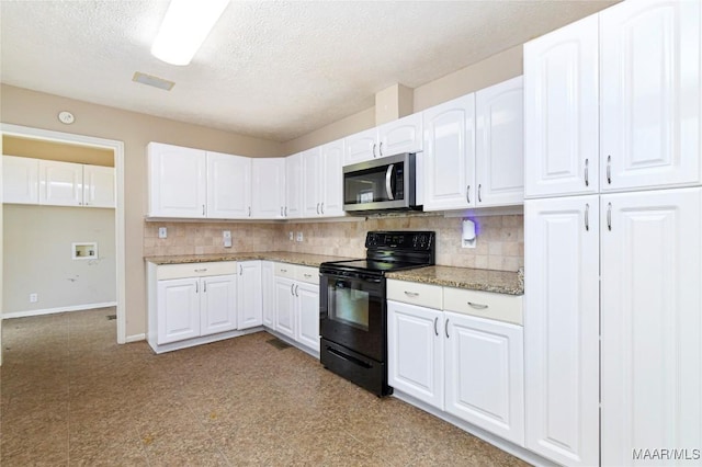 kitchen featuring black / electric stove, backsplash, light stone countertops, and white cabinets