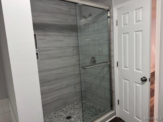 bathroom with an enclosed shower