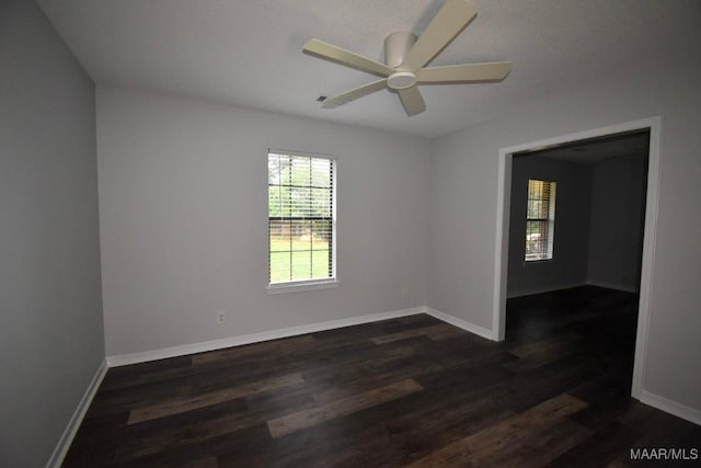 6515 Redland Rd, Wetumpka, AL 36093 - empty room with a ceiling fan, baseboards, and dark wood finished floors