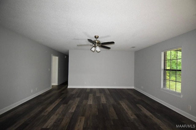 6515 Redland Rd, Wetumpka, AL 36093 - unfurnished room with dark wood-style flooring, a textured ceiling, baseboards, and a ceiling fan