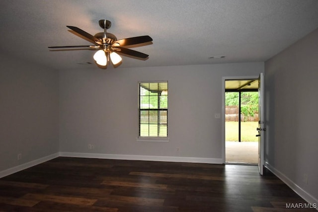 6515 Redland Rd, Wetumpka, AL 36093 - empty room featuring baseboards, a ceiling fan, and dark wood-style floors