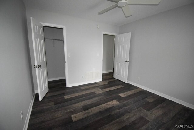 6515 Redland Rd, Wetumpka, AL 36093 - unfurnished bedroom featuring baseboards, a ceiling fan, and dark wood finished floors
