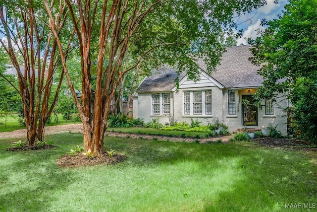 view of front of home with a front yard