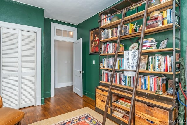 sitting room with dark hardwood / wood-style floors