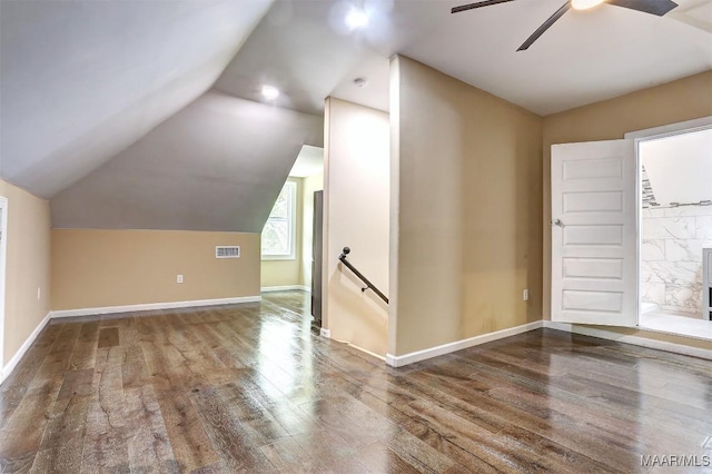 bonus room with vaulted ceiling, hardwood / wood-style floors, and ceiling fan