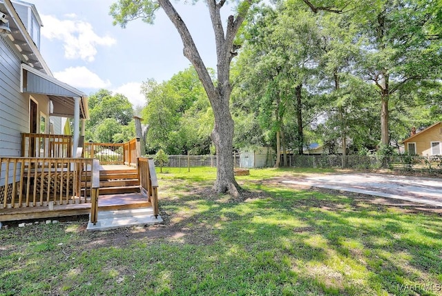 view of yard with a deck