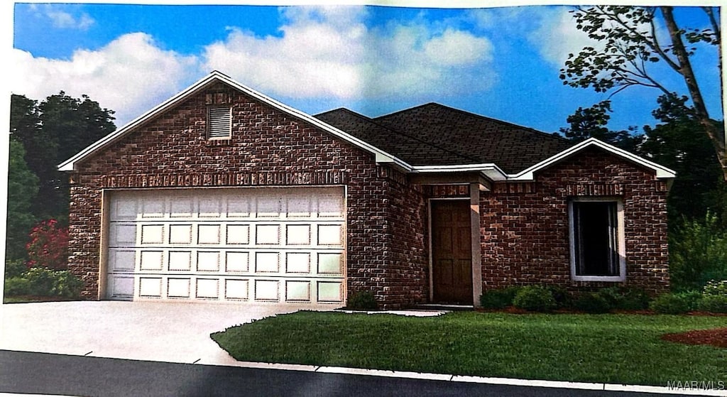 view of front property featuring a garage and a front yard