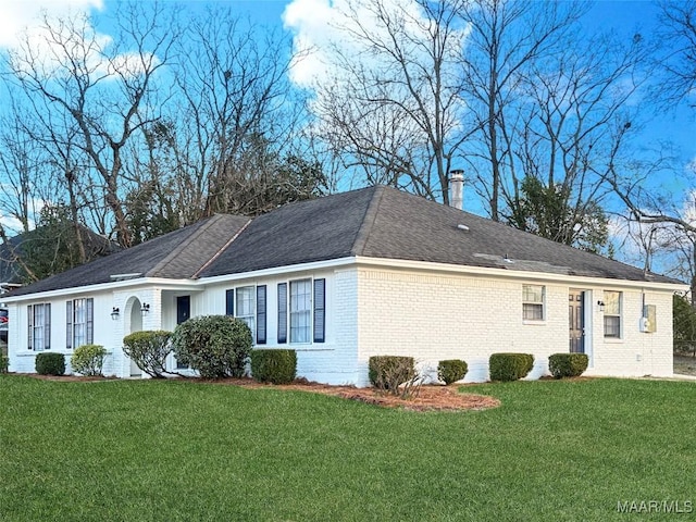 view of property exterior with a yard