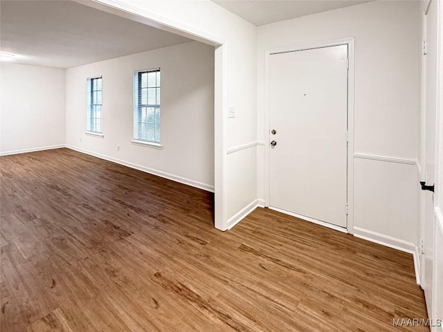 foyer entrance featuring dark hardwood / wood-style flooring