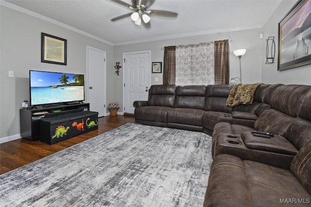 living room with crown molding, ceiling fan, and dark hardwood / wood-style flooring