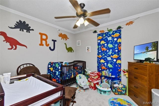 carpeted bedroom featuring crown molding and ceiling fan