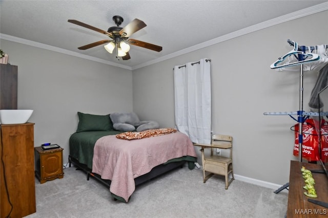 bedroom featuring light carpet, crown molding, and ceiling fan