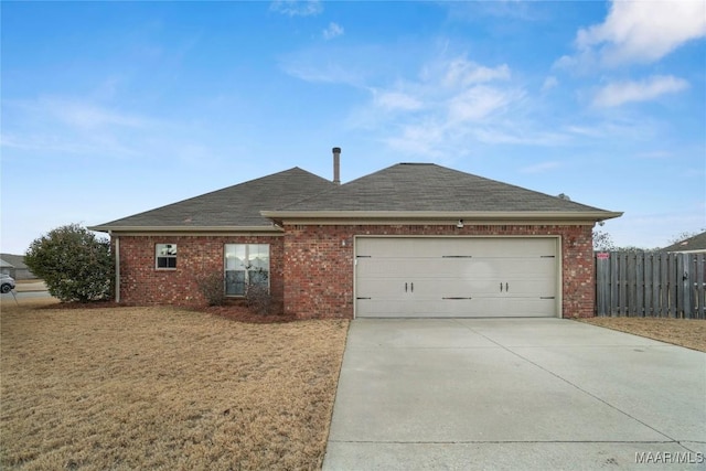 single story home with a garage and a front yard