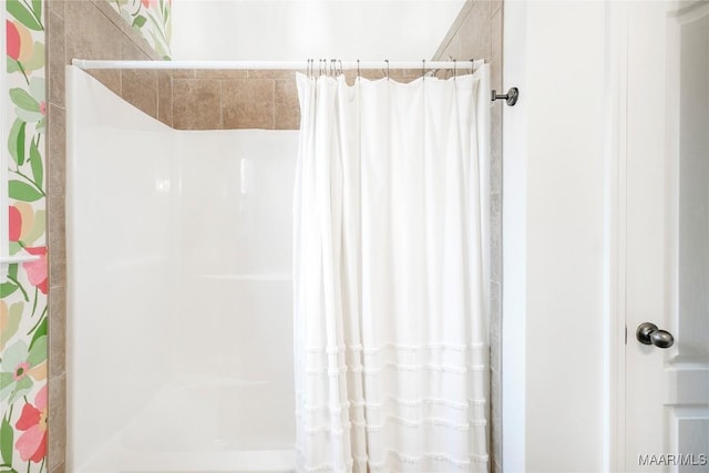 bathroom featuring walk in shower