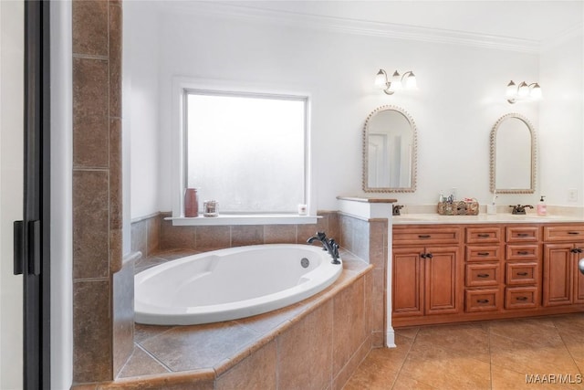 bathroom featuring ornamental molding, tiled bath, tile patterned flooring, and vanity